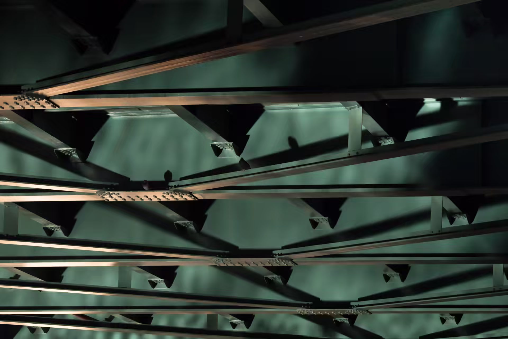 Underside of a concrete bridge deck and its supporting piers